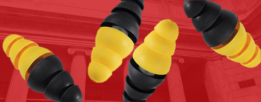 ear plugs on red background